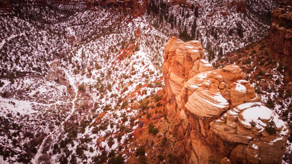 High above the red and white and green of Rough Canyon