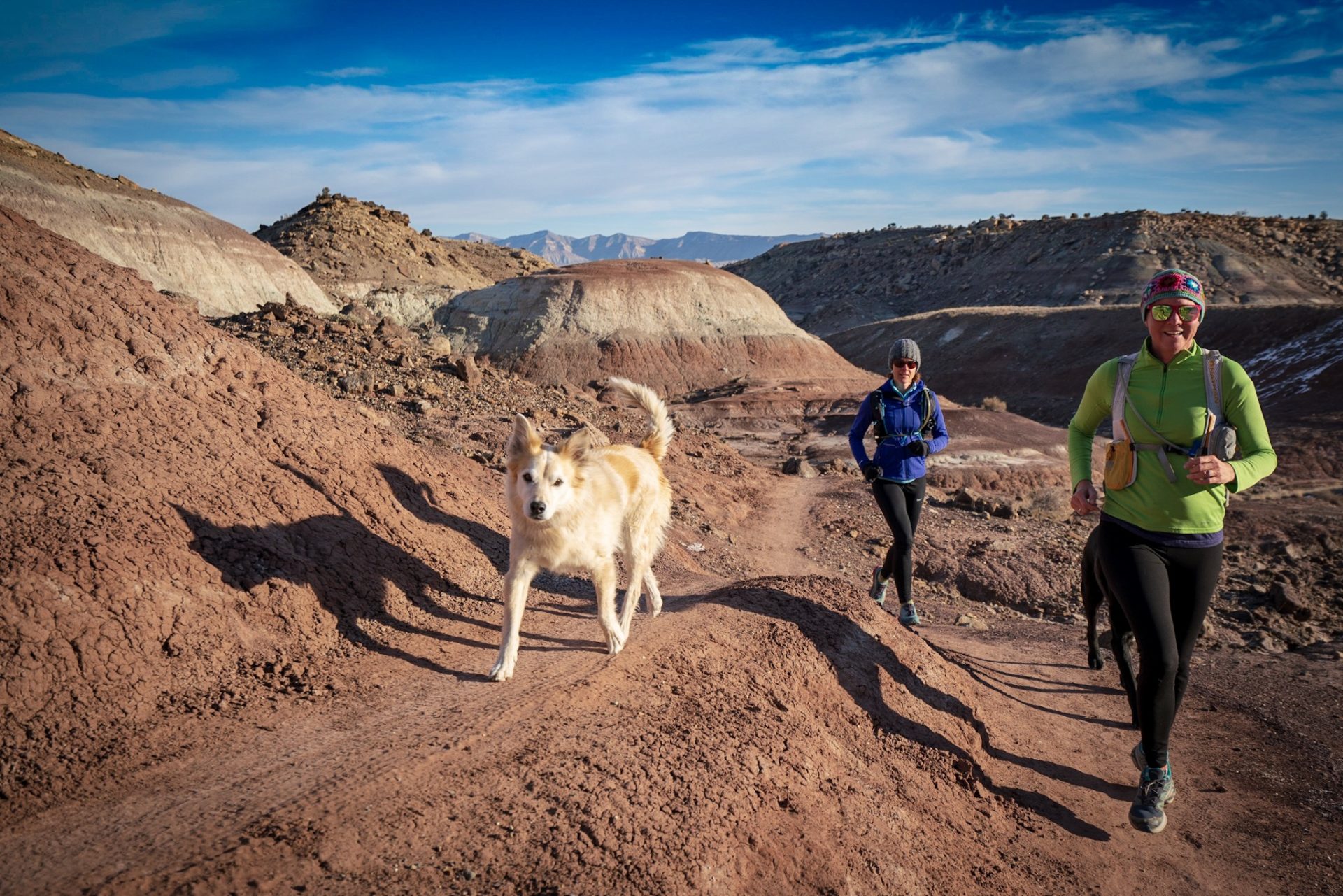 Miles and his owner and her friend run a desert trail in the Lunch Loops trail system in Gran Junction, Colorado